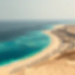 Panoramic view of Al Zeina Beach showcasing pristine sands and azure waters