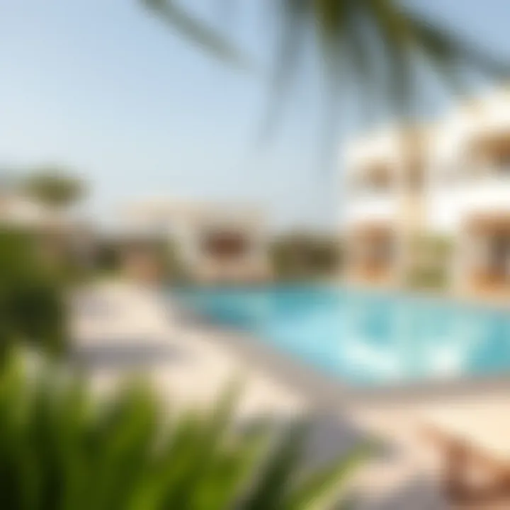 Community amenities including a pool and lush landscaping around Club Villas