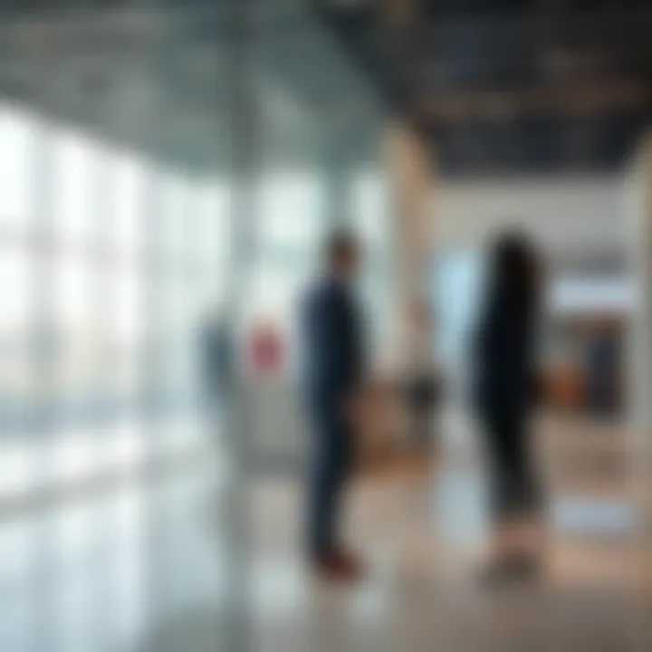 Engagement at Al Jurf Sales Center View of the Al Jurf Sales Center with prospective buyers engaging with staff