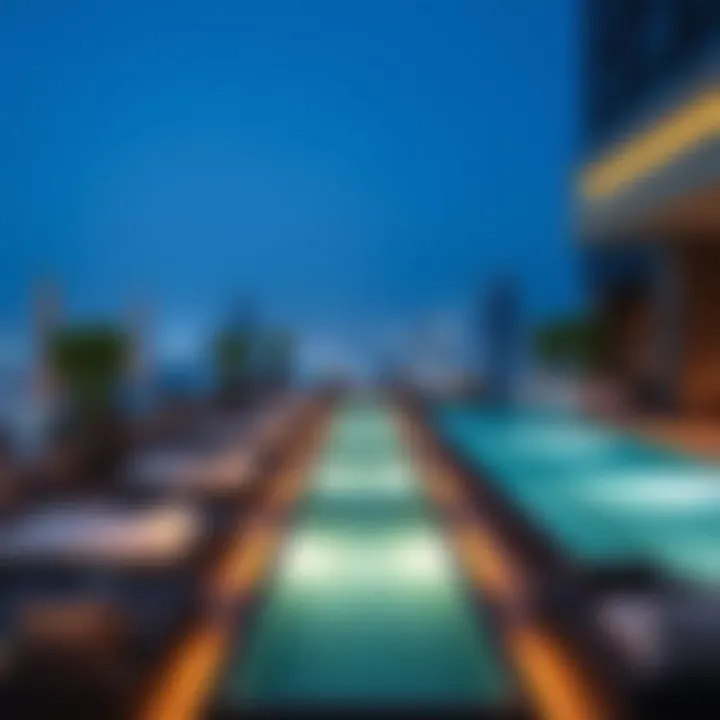 Elegant rooftop pool area at W Residences with city skyline view